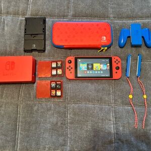 Nintendo Switch 1 (Mario Edition) + 8 games & all original accessories